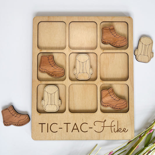 a wooden puzzle with a picture of a pair of shoes and a pair of shoes