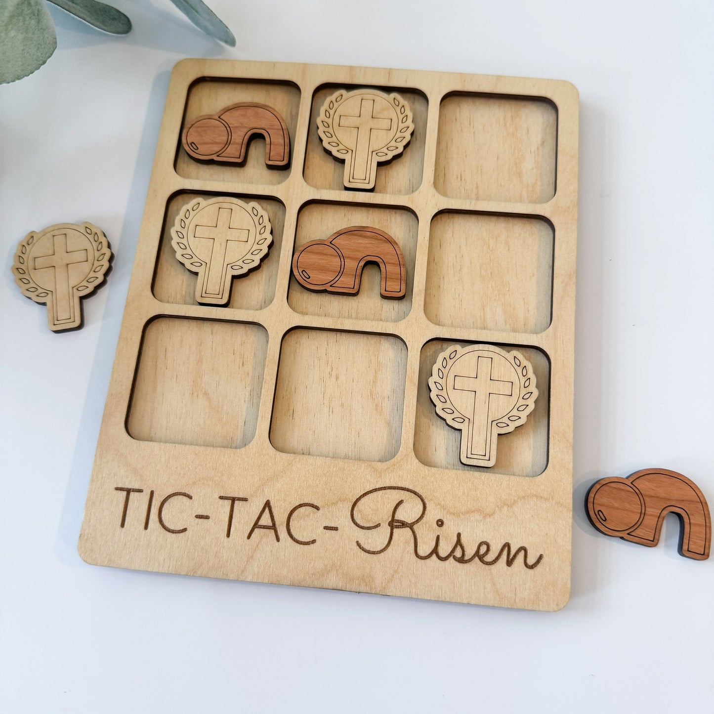 a wooden puzzle with wooden animals on it