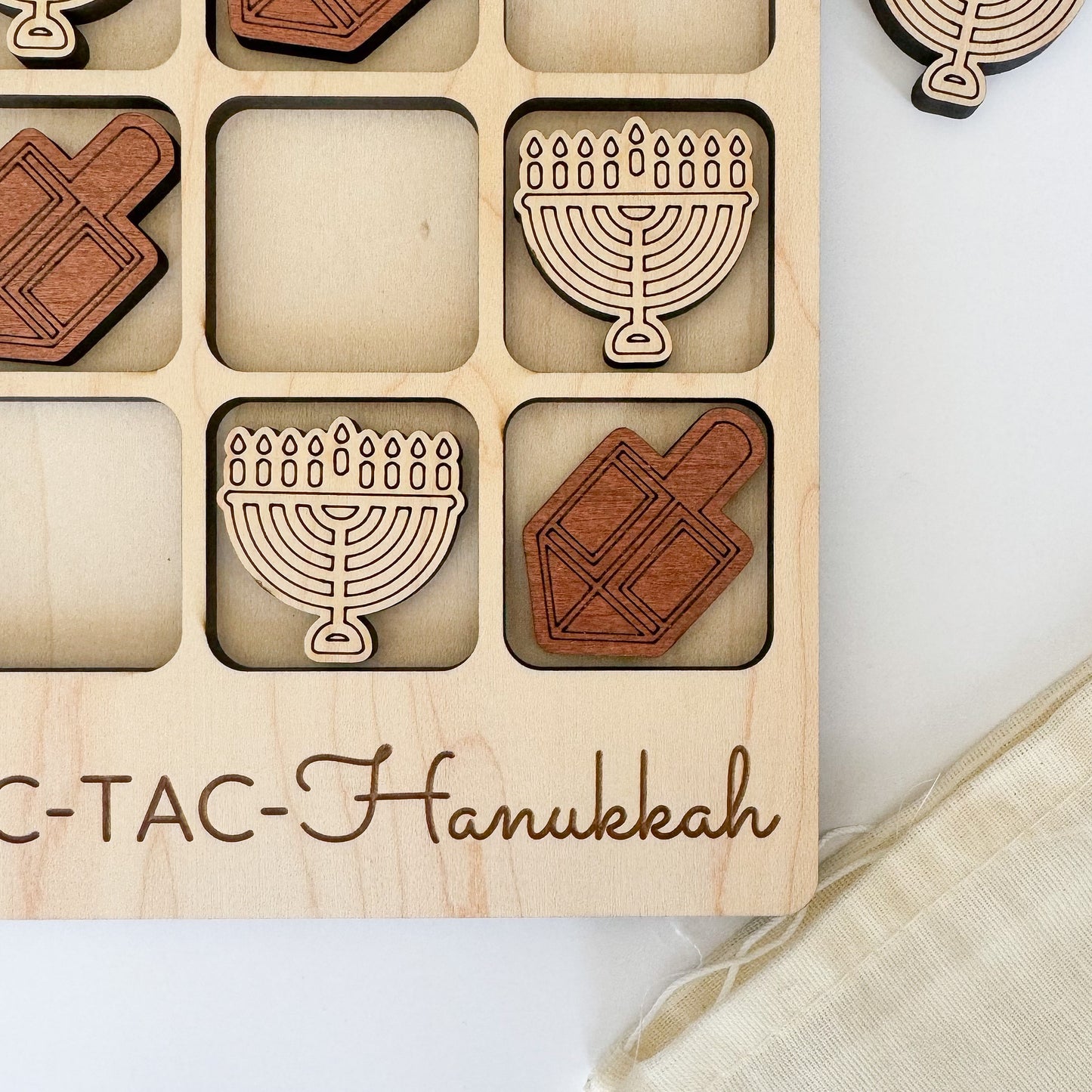 a wooden hanukkah puzzle with hanukkah decorations