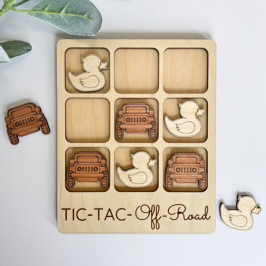 a wooden tic - tac - off board with cutouts of ducks and