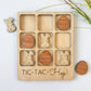 a wooden tic - tac - tac - toe board with wooden easter