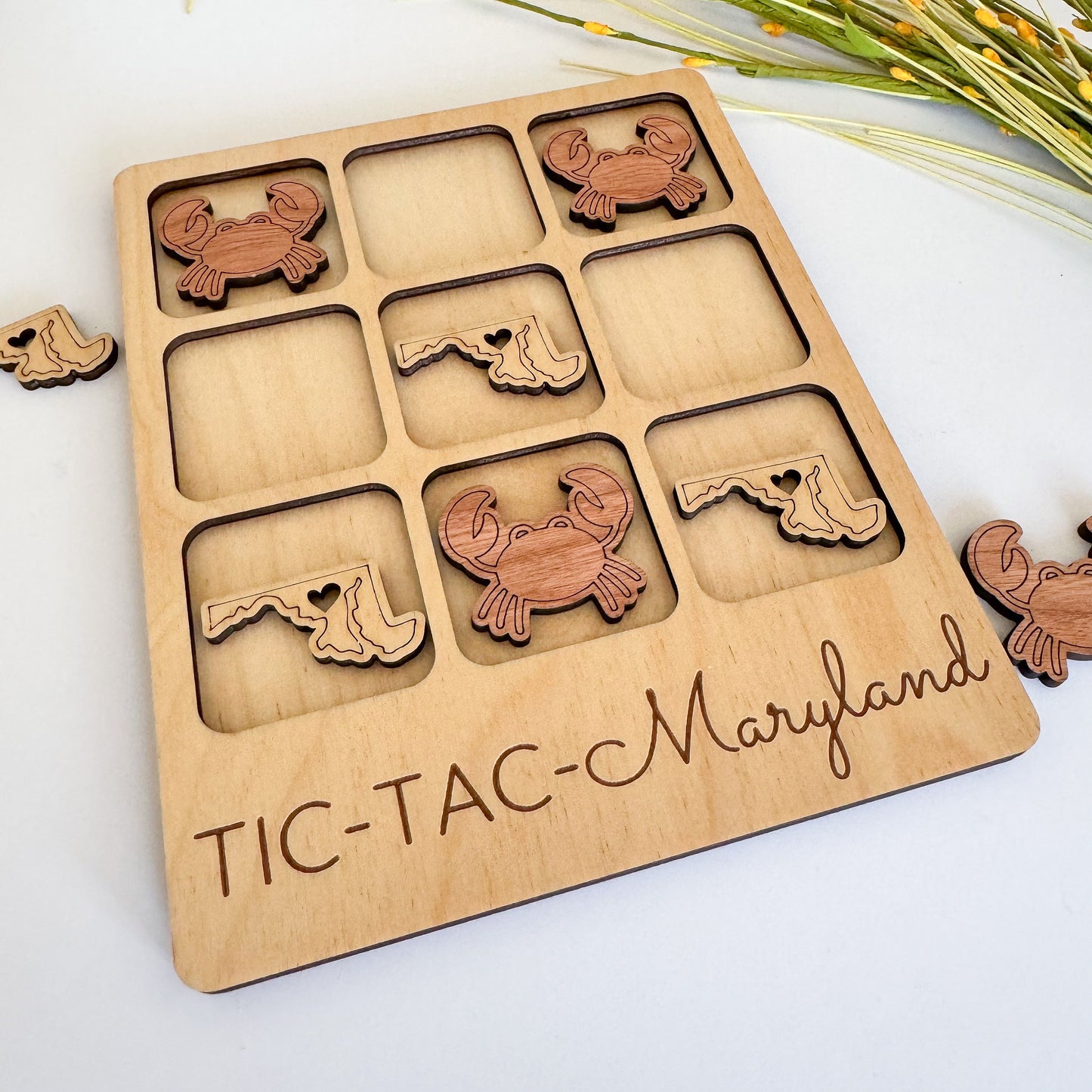 a wooden tray with cutouts of animals on it