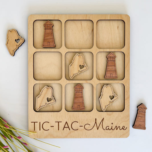 a wooden puzzle with a picture of the state of maine