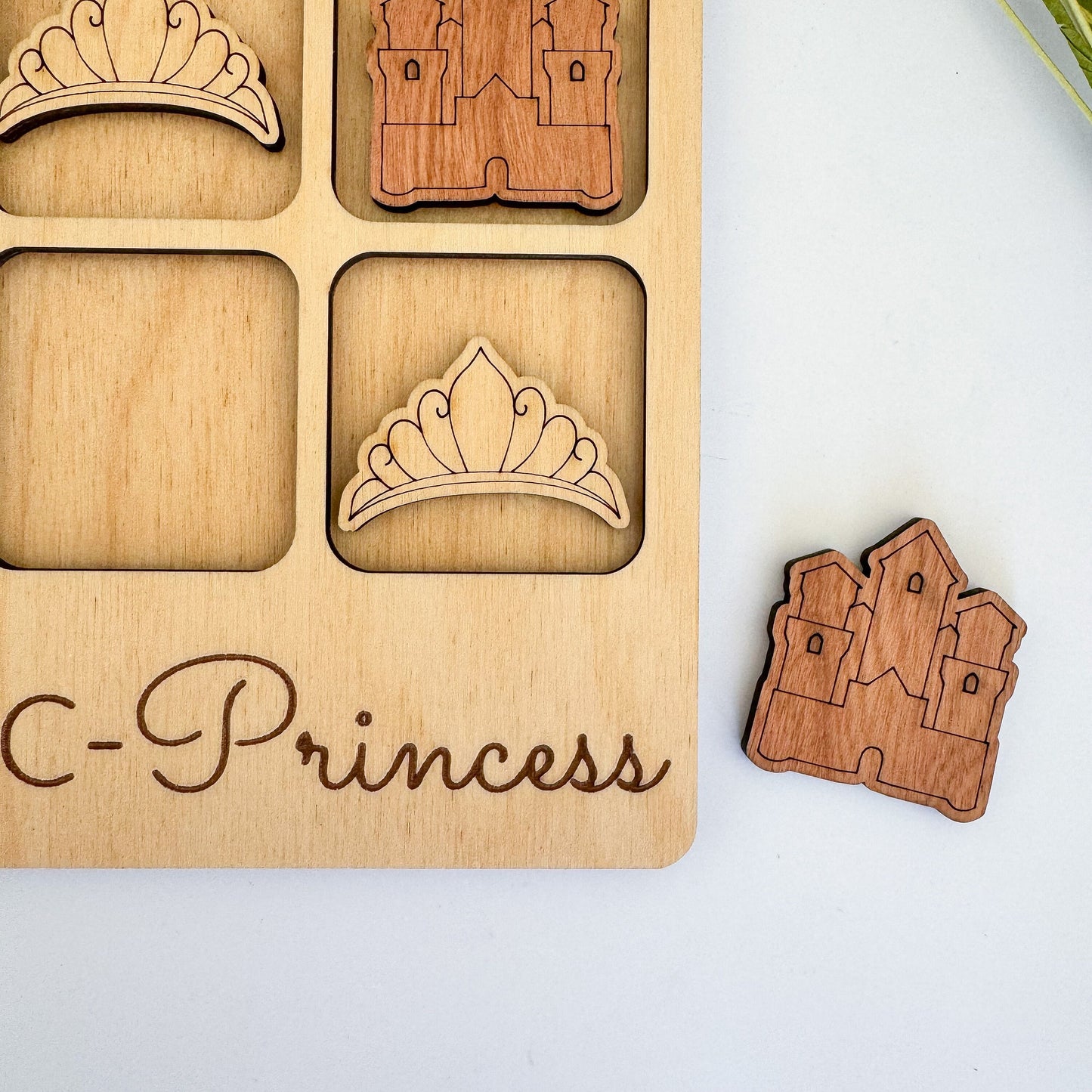 a wooden puzzle with a picture of a castle