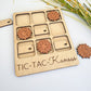 a wooden tic tac - tac - kandos game with flowers and