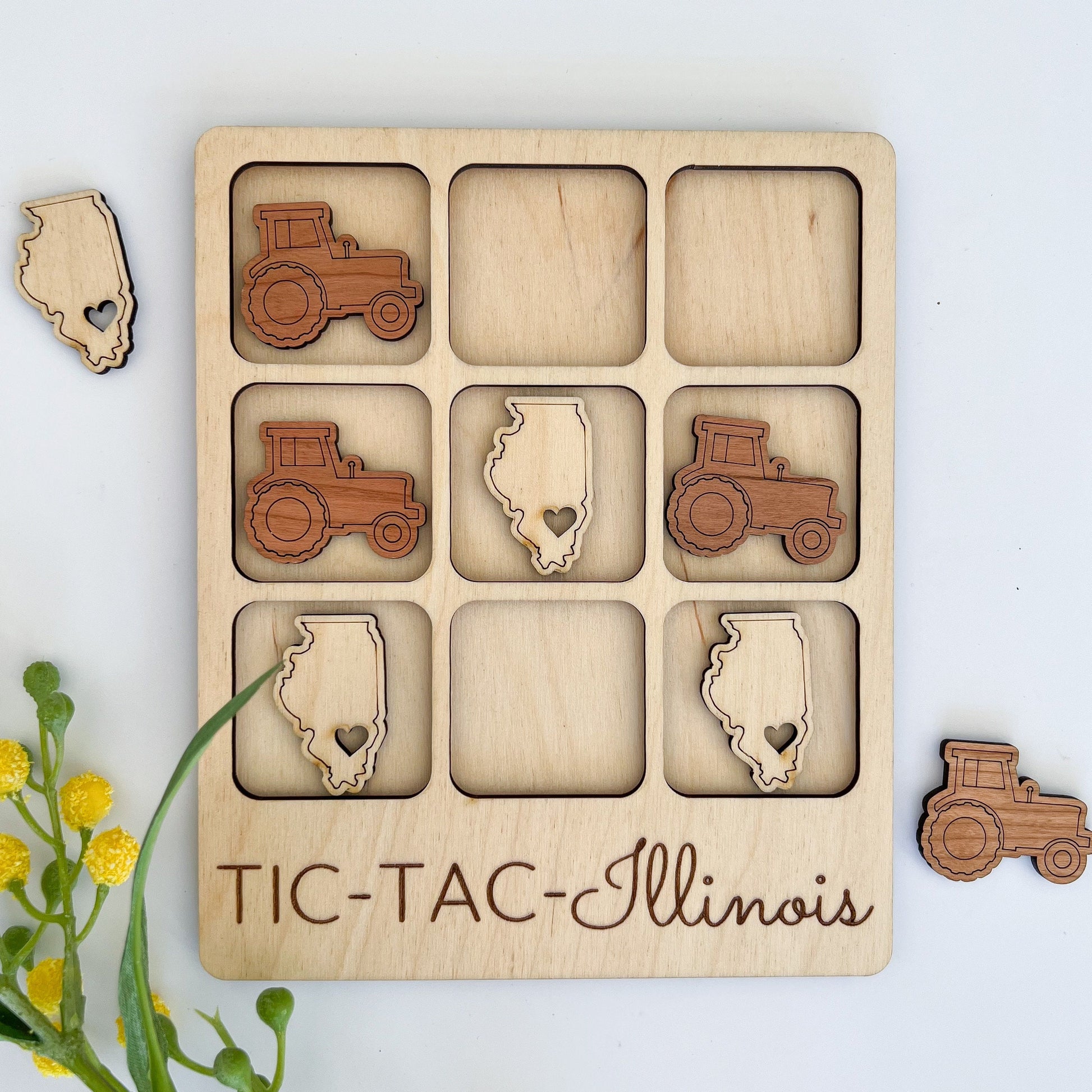 a wooden puzzle with a picture of a truck and a tractor