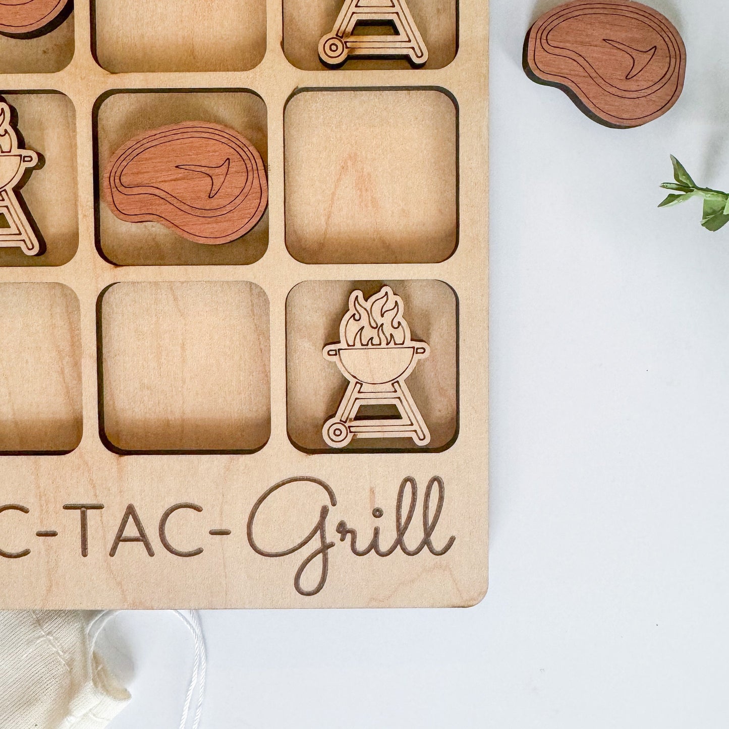 a wooden tray with magnets and magnets on it