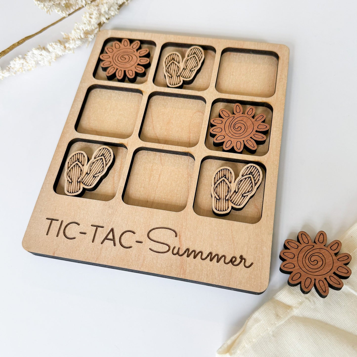 a wooden tic - tac - summer board with a flower and butterfly design