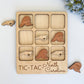 a wooden puzzle with a picture of a bear and other animals