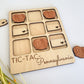 a picture of a wooden tic tac - tac game