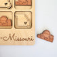 a wooden puzzle with a picture of the state of missouri