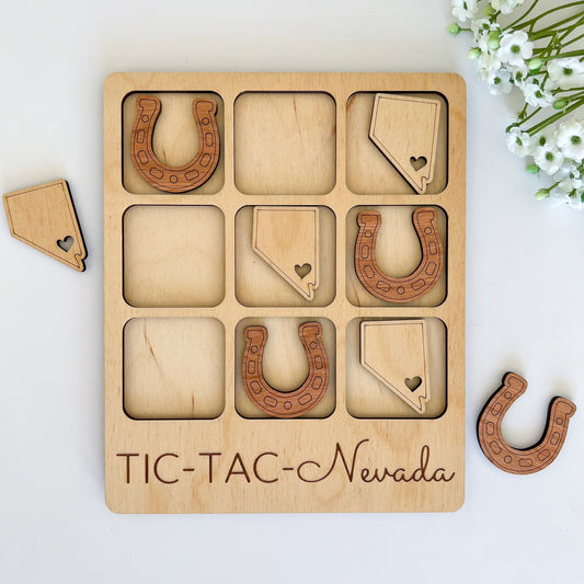 a wooden puzzle with a horse shoe and horseshoes