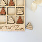 a wooden puzzle with a picture of a person sitting in a lotus position