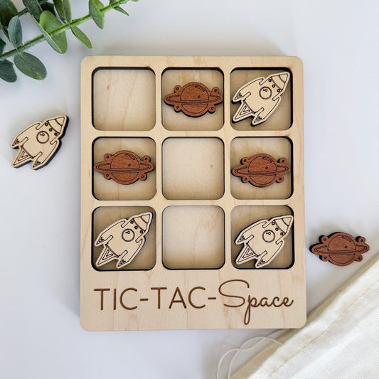 a wooden tic - tac - space game with space shuttles