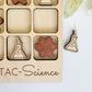 a set of wooden magnets with a science theme