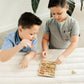 a boy and a boy playing with a puzzle