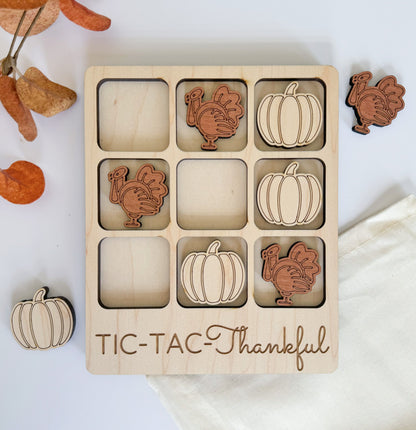 a wooden thanksgiving puzzle with turkeys and pumpkins