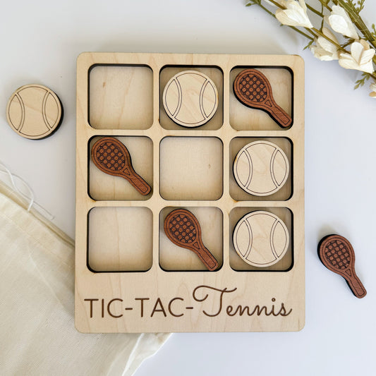 a wooden tic - tac - tennis game with four wooden pieces