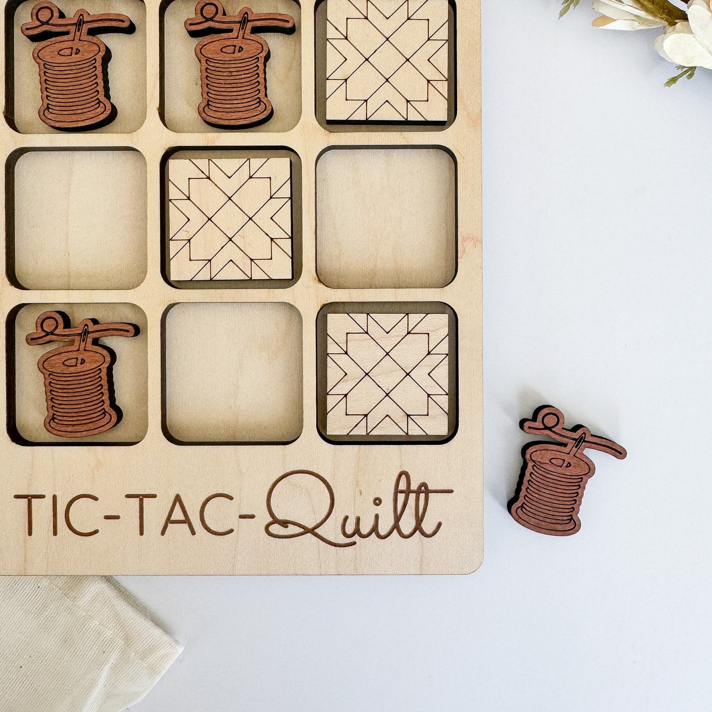 a close up of a wooden tray with buttons