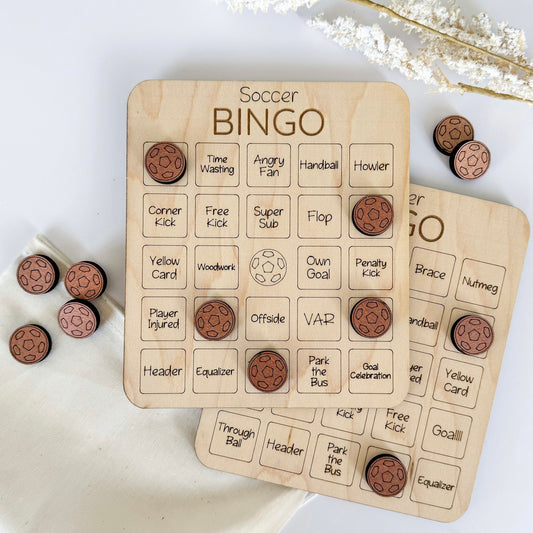 a couple of wooden buttons sitting on top of a table