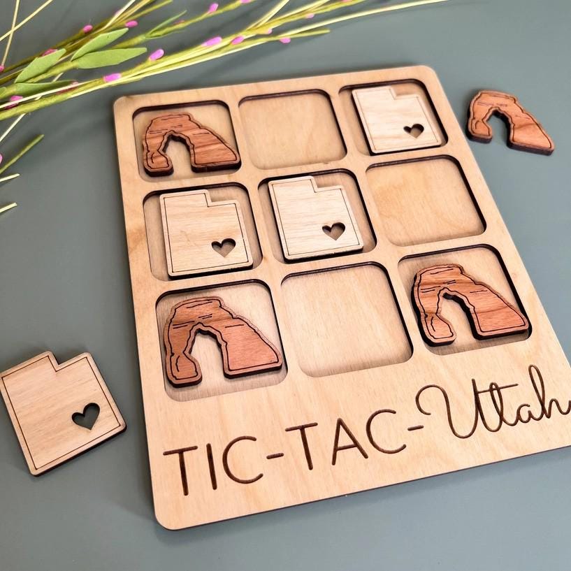 a picture of a wooden tic - tac - tac - tac