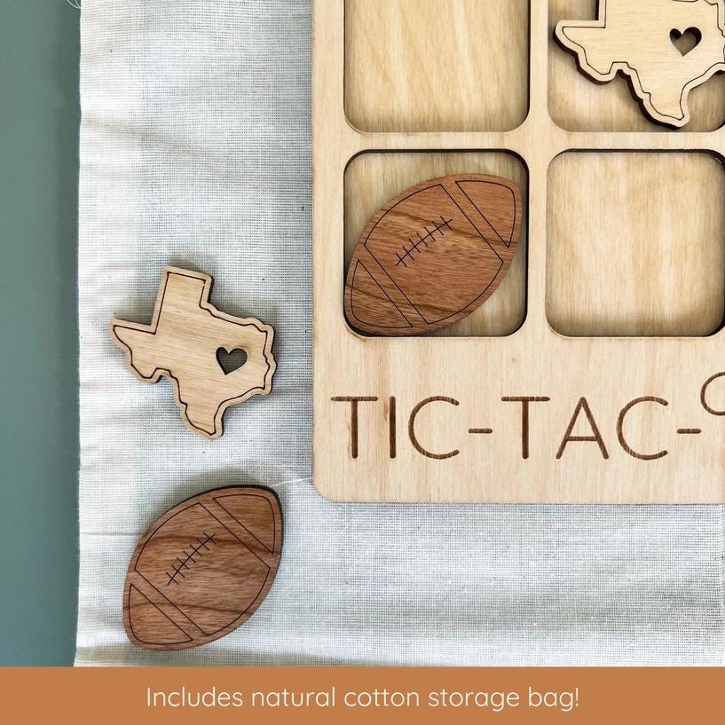 a wooden tic - tac - toe game with a texas map and a